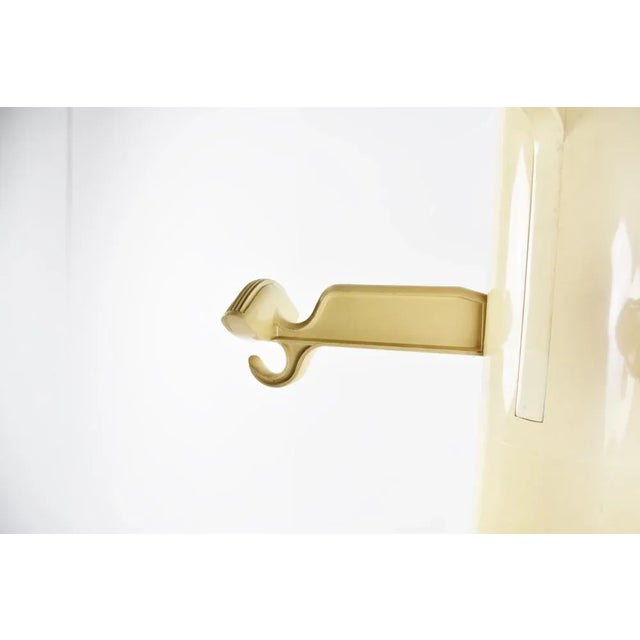 Vintage space age coat stand designed by Giancarlo Piretti for Castelli model 'planta'. Handy detractable hooks and...