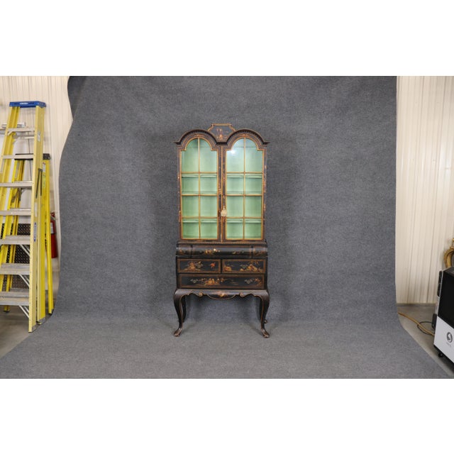 An exceptional and highly decorative Georgian style chinoiserie vitrine cabinet, masterfully crafted with elegant...