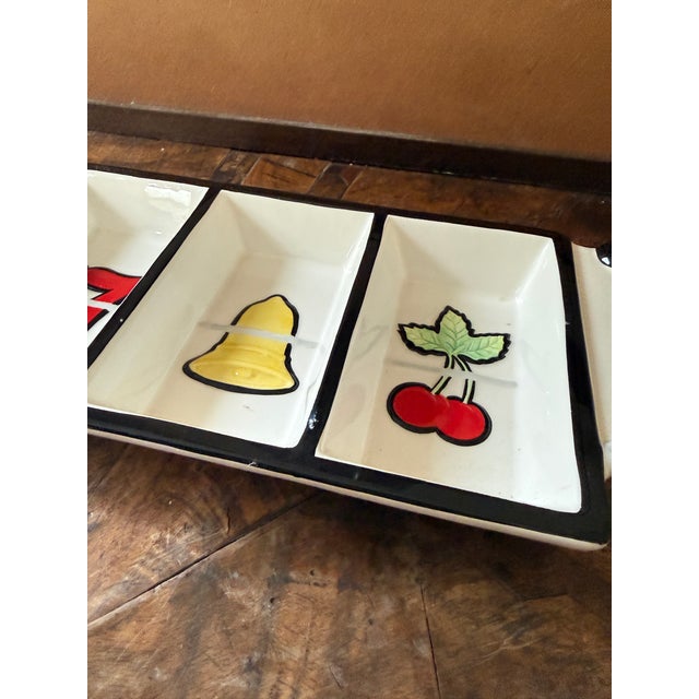 A fun vintage Fitz and Floyd Game Night appetizer dish designed like a classic slot machine, with three divided...
