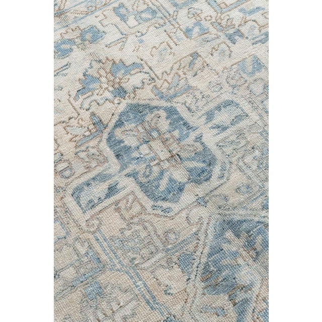 The Heriz district of NW Persia has been weaving carpets for over a century, with geometric designs and tonalities ranging...