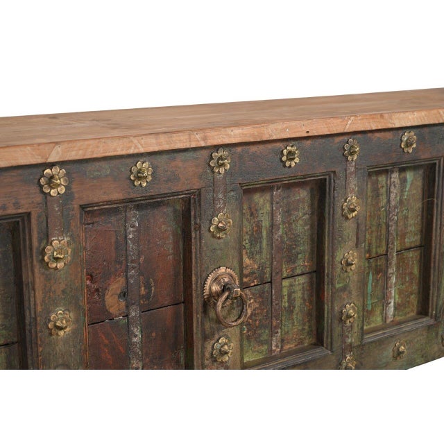 This Console Table is a distinctive handcrafted furnishing that artfully combines historic architectural fragments with...