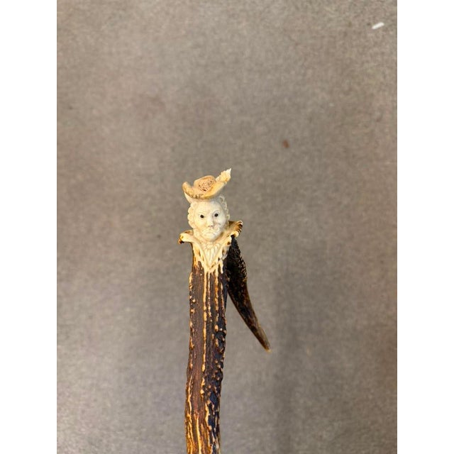 A very rare and unusual 19th-century accountant's cane featuring a carved Spanish guard made from antler and a remarkable...