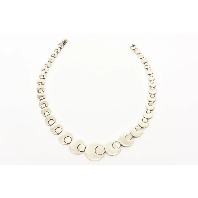 This is part of Chairish’s Costume Jewelry assortment. This stunning sculptural reticulated vintage sterling silver...