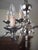 2000 - 2009 White Metal 12-Arm Chandelier For Sale - Image 5 of 7