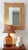 Large Mid-Century Modern mirror featuring a frame crafted from bamboo, cane, and woven rattan. Handmade in Spain circa the...