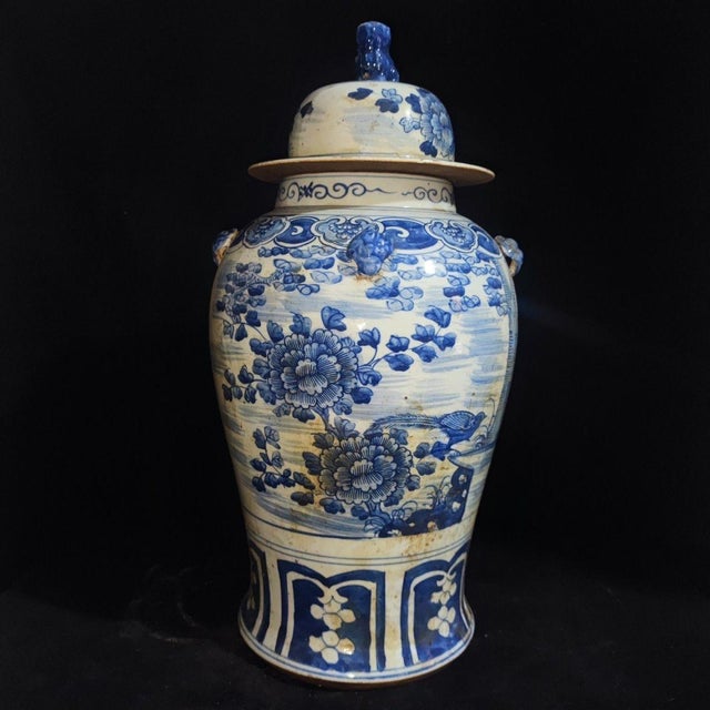 A striking pair of large Chinese blue and white porcelain "General Jars." These substantial vessels are hand-painted in...