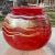 Boho Chic 1980s Signed Large Orange Red Art Glass Vase With Silver Ribbon Trim For Sale - Image 3 of 6