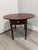 Georgian-Style mahogany and crossbanded Pembroke table. Cross-banded with string inlaid top and oval drop leaf Pembroke...