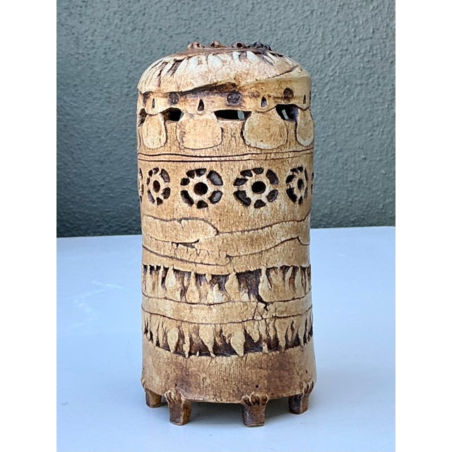 This remarkable studio pottery vase is a masterclass in Brutalist texture and artisanal craftsmanship. Hand-thrown and...