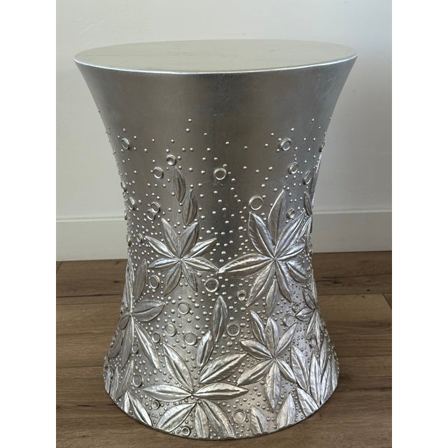 Thomas Pheasant’s Petal Drum Table for Baker Furniture, was inspired by the carved blossom facade of a 1930’s Art Deco...