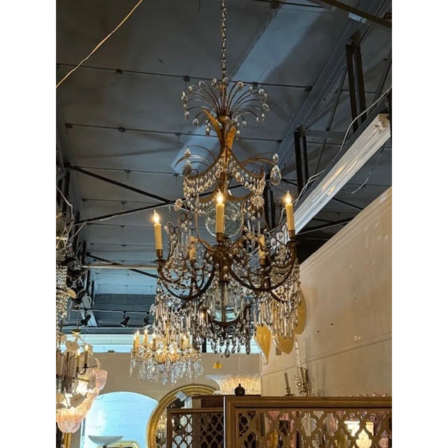 Lovely 19th century gilt brass and crystal Swedish chandelier. Take note of the beautiful draping base covered in crystal...