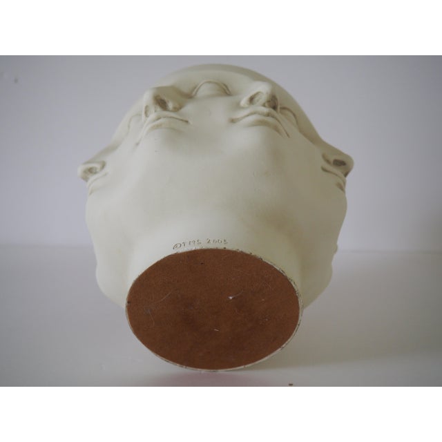 Mid-century Modern Fornasetti-style perpetual face vase marked TMS 2005.