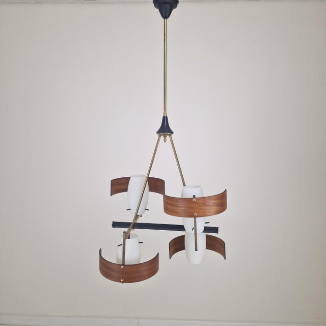 An exceptional and highly elegant Italian mid-century modern chandelier from the 1960s, designed by the renowned...