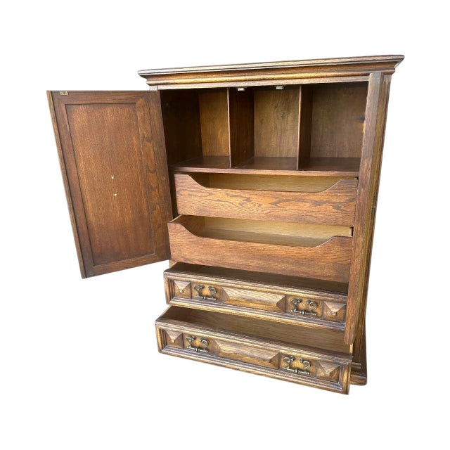 Splendid carved solid oak Spanish Colonial Revival piece expertly crafted in Lexington, North Carolina. Dovetail drawers....