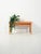 Scandinavian oak bench from the 1960s with a built-in flowerpot: clean lines, functional details, and a light presence....
