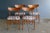 - Pair of dining chairs by Schiønning & Elgaard - Made in the 1960s - Solid teak frames - Backrests in form-laminated teak...