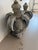 A striking pair of large-scale antique zinc finials, originally crowning the roofline of a bank building in Paris. Hand-...