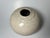 Globular form raku fired pottery vase. Finely crafted with well defined ring around mouth, consistent wall thickness and...