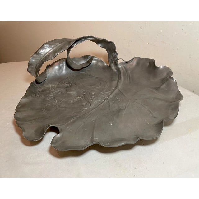 Up for sale is a large antique original J.R. Hannig Art Nouveau pewter centerpiece dish. It's done with exquisite...