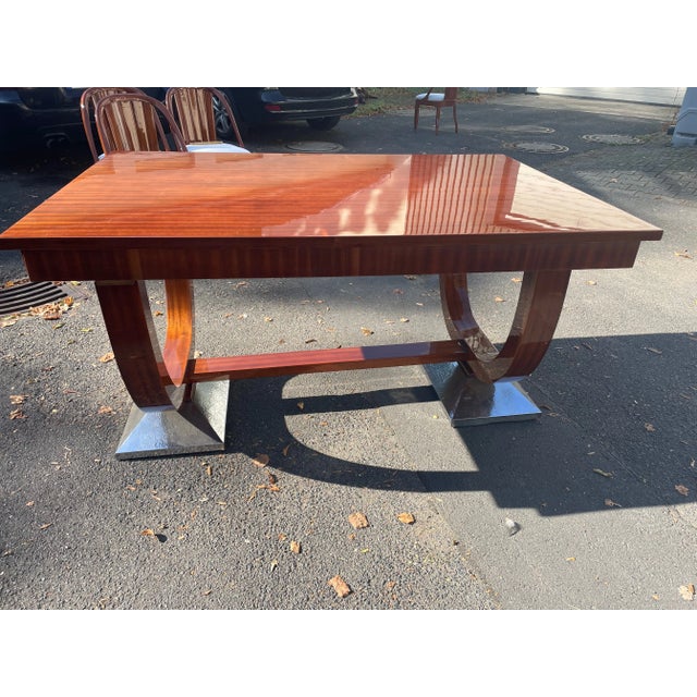 Art Deco dining table with 6 matching Art Deco gondola chairs. France, 1920s. Decorative original Art Deco dining table...