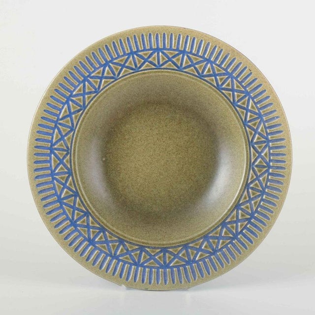 Mari Simmulson for Upsala-Ekeby Art pottery bowl, model 7000, 1960s. Decorative stoneware bowl with olive-green glaze and...