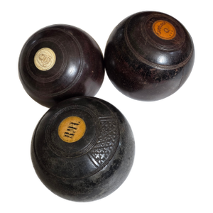 Three Antique Lignum Vitae Lawn Bowling Balls