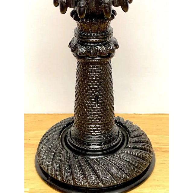 Exceptional 19th century Irish carved bog wood castle motif candlestick, Intricately carved, the bobeche with a continuous...