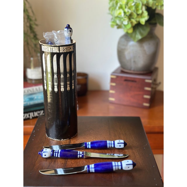 An exceptionally rare and whimsical set of dinner knives designed by the renowned Danish artist Bjørn Wiinblad for...
