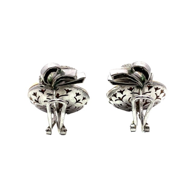 Elevate your elegance with our stunning white pearl and diamond earrings, crafted from high-quality silver metal. Each...