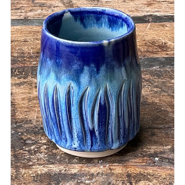 This vintage studio pottery vase is a refined example of mid-century modern ceramic artistry, celebrating form, texture,...