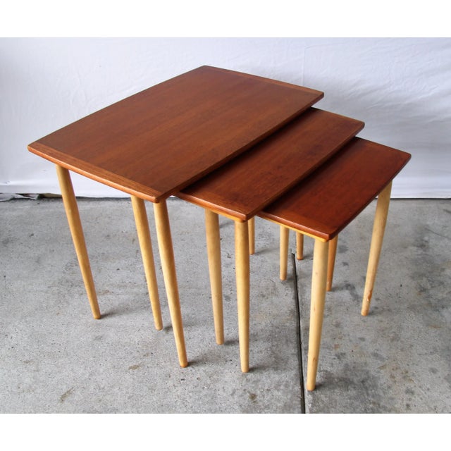 Charming Set of Three (3) Nesting Tables Designed by George Nelson for Herman Miller. The rare set is made of solid maple...