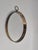 Pocketwatch shaped mirror with brass frame, by Firma Svensk Tenn, Sweden Modern 1950s. with beautiful patina which shows...