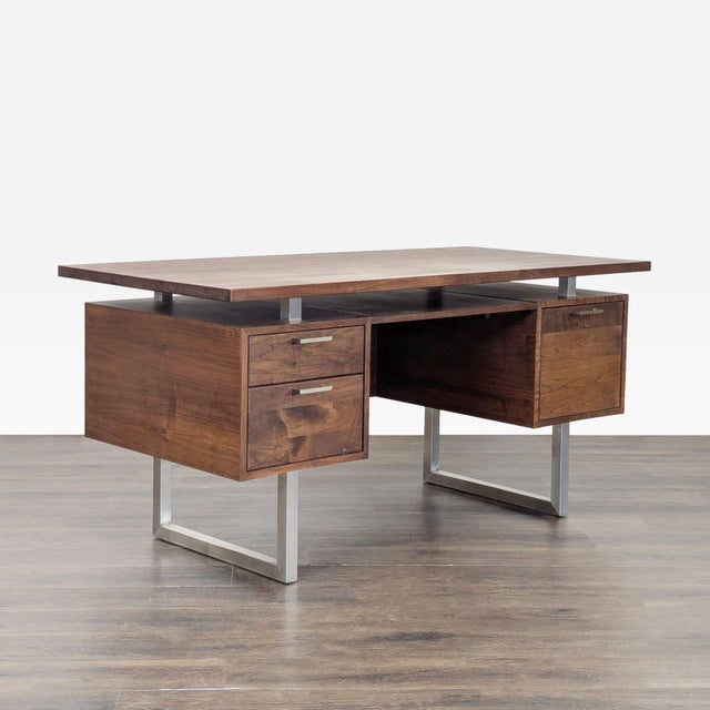 Crate & Barrel modern wood and metal desk featuring a warm walnut-toned finish and clean architectural design. The...
