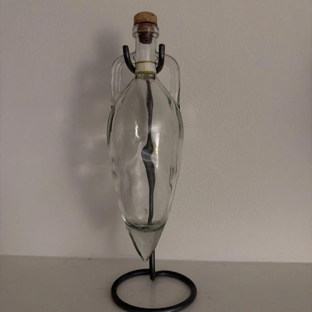 The Vintage Shonfel's Torpedo Glass Wine Decanter with Metal Hanging is a collector's piece of MCM decor that adds a touch...