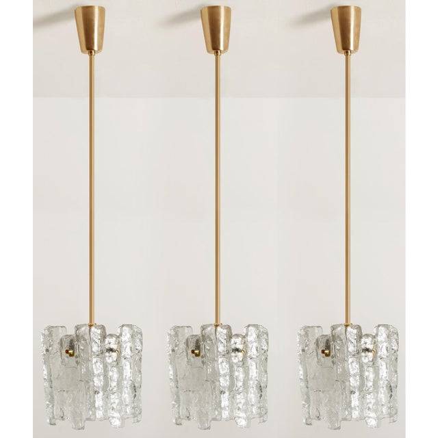 A pair of very beautiful and elegant modern chandeliers, manufactured by Kalmar Austria in the 1970s. Lovely design, each...