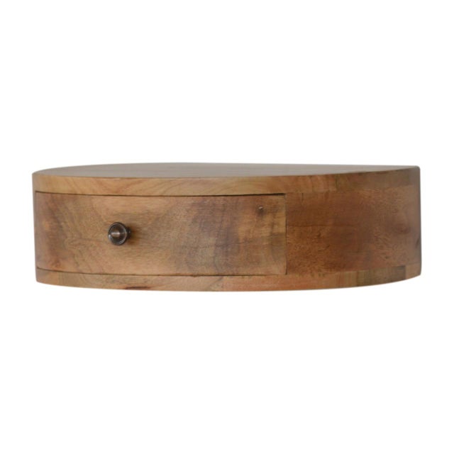 Save floor space with this floating nightstand in an oak-ish finish. The rounded profile softens the look, while one...
