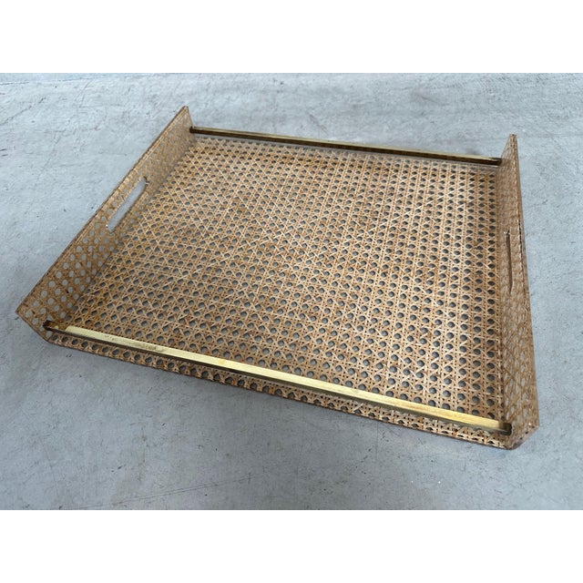 Beautiful vintage Christian Dior tray from the 1970s, made of acrylic glass with inlaid rattan and brass details....