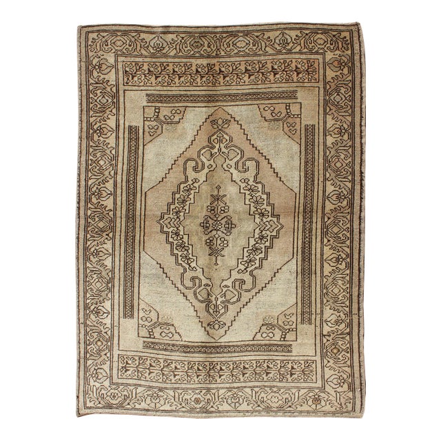 Vintage Turkish Oushak Carpet With Stylized Design in Brown, Cream, and Tan For Sale
