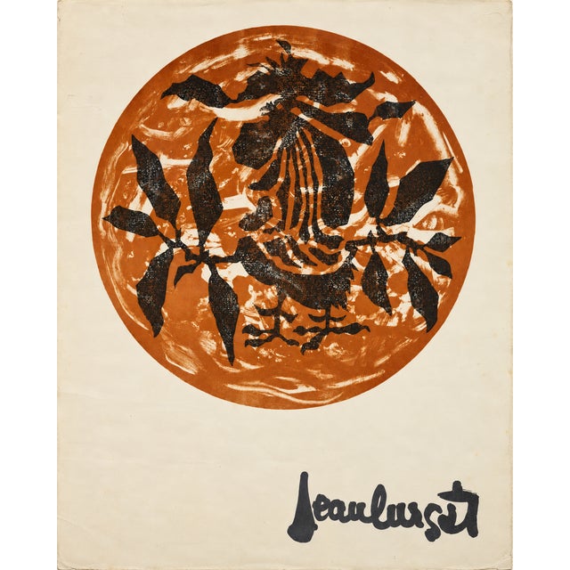A color print by Jean Lurçat (1892–1966) depicting a large stylized rooster within an ochre-orange disc, surrounded by...