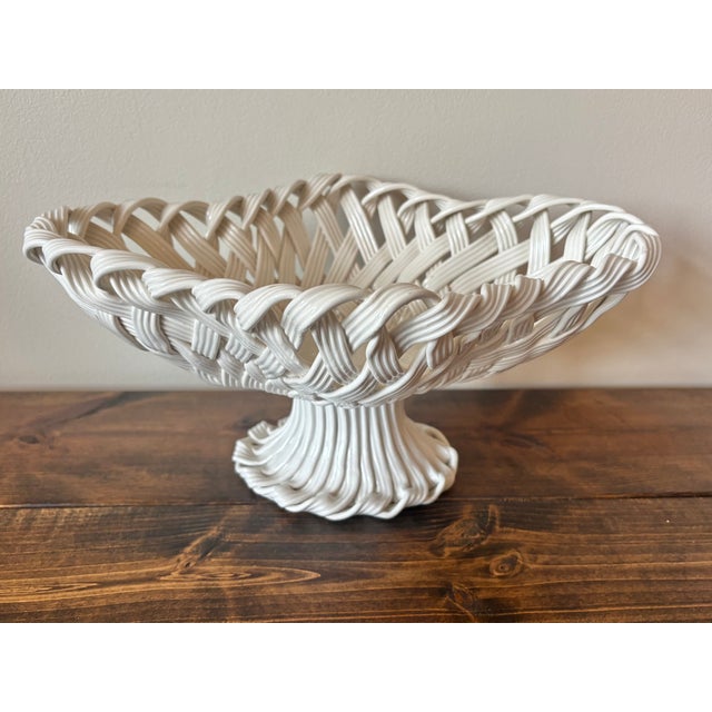 Beautifully Italian handcrafted white weaved ceramic bowl or basket on pedestal. Marked Italy on underside. C. 1970s. Most...