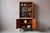 Straight out of the 1960s, this beautiful two-part bookcase exudes the refined elegance of modernist design. Entirely clad...