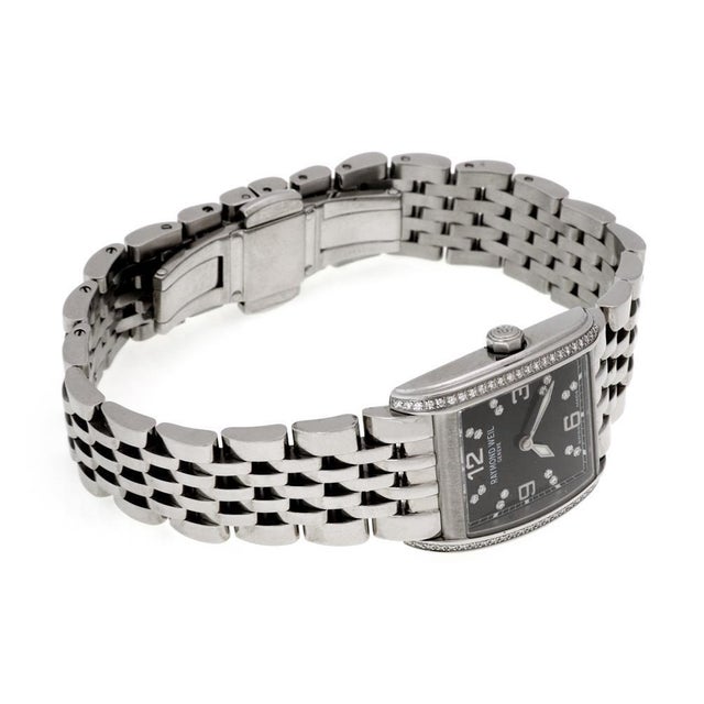 This is a lovely ladies wrist watch by Raymond Weil from the Don Giovanni collection. The case and band is in stainless...