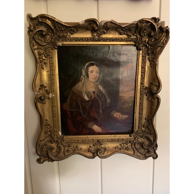 Gorgeous pair of Early 19thC English oil on canvas portraits in hand carved gilded wood frames. Lady and Gentleman.