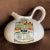 Charming Dominion of Canada creamer. Nice addition to any table setting.