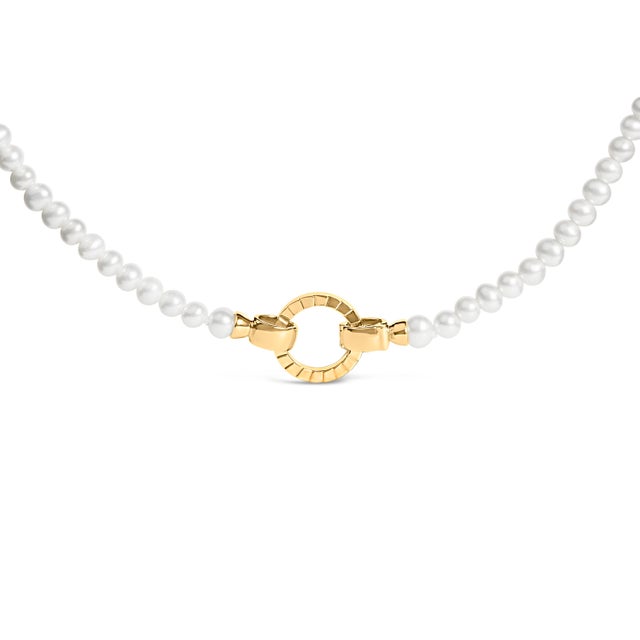 Entwine your neckline with the timeless elegance of cultured freshwater pearls, gracefully arranged along a 16.5-inch...