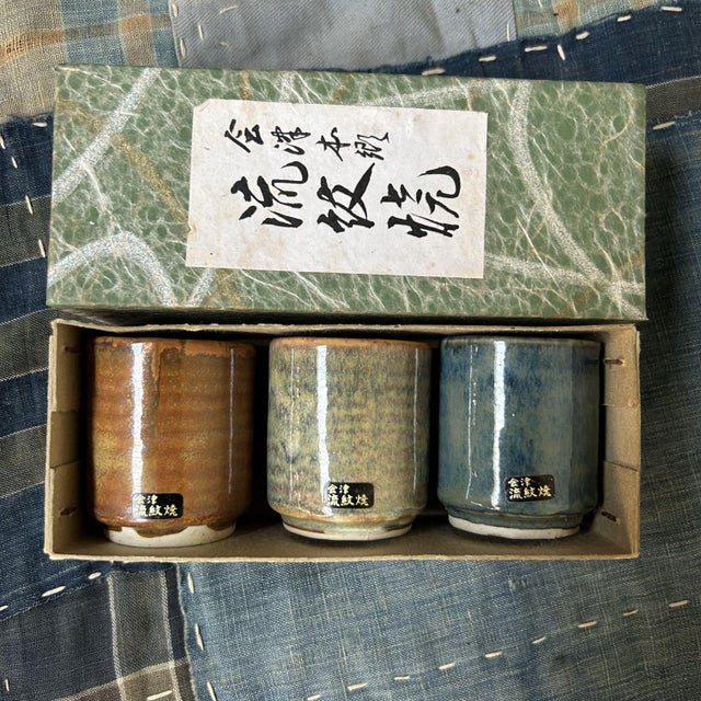 A charming set of three small yunomi (Japanese teacups) from the Aizu Hongo region, known for its long-standing ceramic...