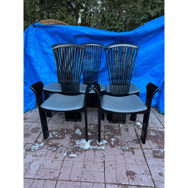 Heroic set of Post Modern, Hollywood Regency school black lacquered dining chairs made in Italy by Pietro Costantini,...