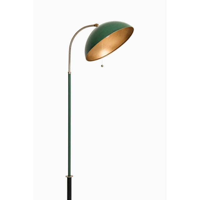Floor lamp in frame in white metal, green and black lacquered details by harald notini, 1930's additional information:...