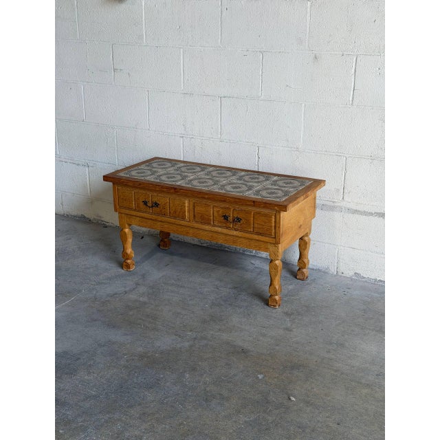 Beautiful vintage Danish oak entry table attributed to Henning Kjærnulf, crafted in Denmark and featuring a stunning...