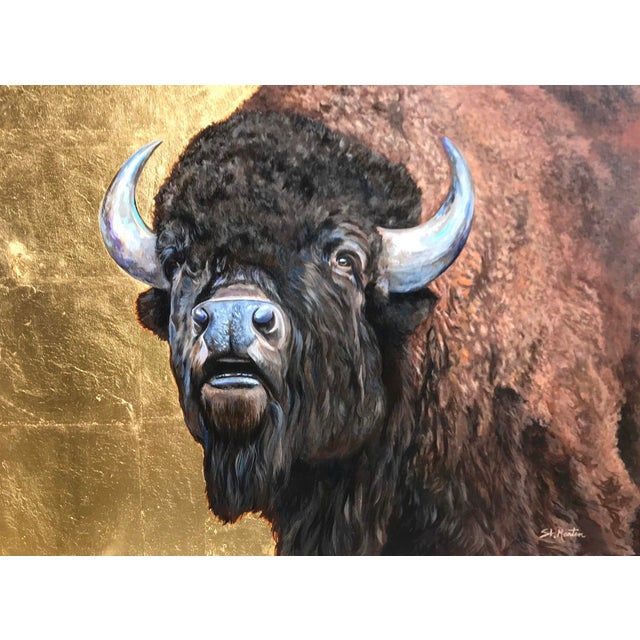 This artwork features a striking bison rendered in rich, textured acrylics, set against a shimmering backdrop of 24k gold....